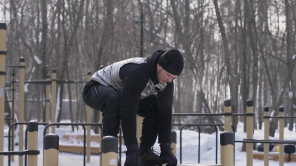 Sport Man Jumping on Bench on Crossfit Training at Sport Ground Outdoor alt