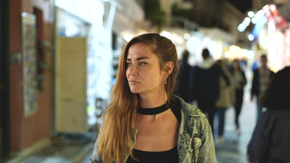 Woman Walks on Streets of Athens City Fascinated By Amazing Shop Showcases