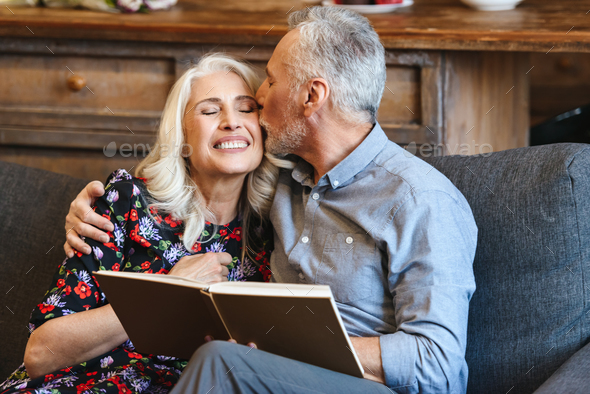Portrait of happy late mature man and woman 70s spending pleasan - Stock Photo - Images