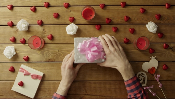 Happy Man Gets Credit Card As Gift, Top View