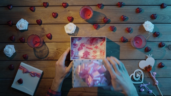 Young Man Gets Empty Box As Holiday Gift, Top View