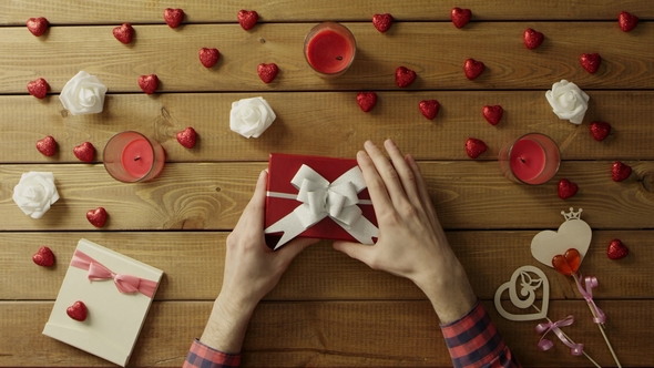 Poor Man Gets Empty Present Box As Valentine Day Gift, Top View