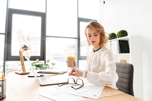 Portrait of a pretty young businesswoman - Stock Photo - Images