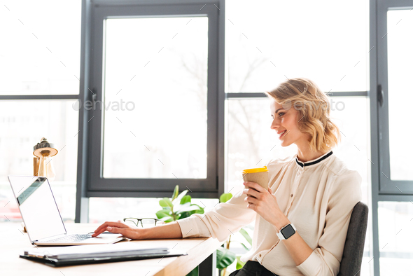 Portrait of an attractive young businesswoman - Stock Photo - Images
