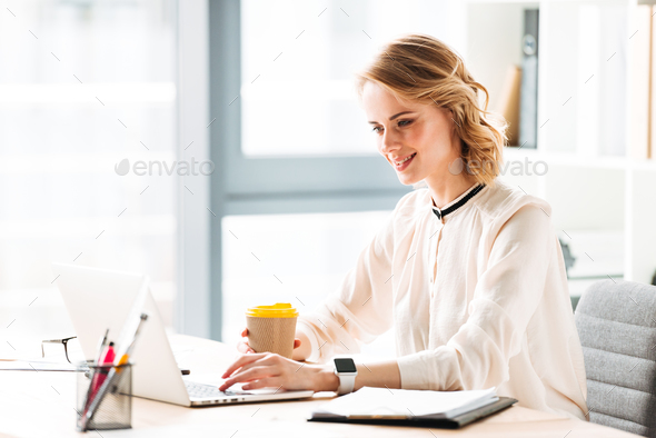 Portrait of a pretty young businesswoman - Stock Photo - Images