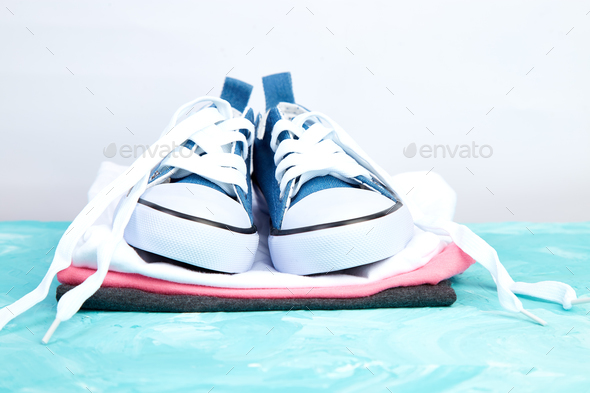 Female sneakers shoes and tee - Stock Photo - Images