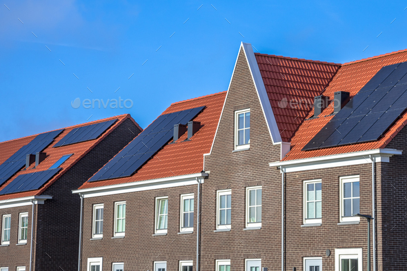 Close up of Modern row houses with solar panels - Stock Photo - Images