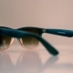A Hand İs Taking Pilot-style Sunglasses From a Table - VideoHive Item for Sale