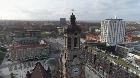 Drone Shot Circulates Around Church Tower