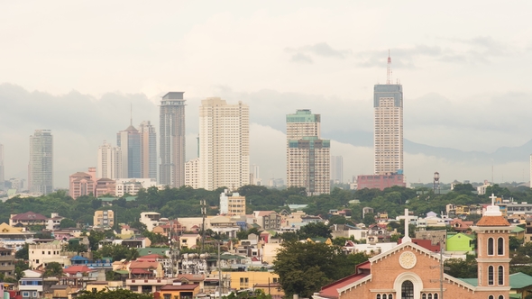 Manila Skyscrapers in the Cloudy Evening. Philippines. alt