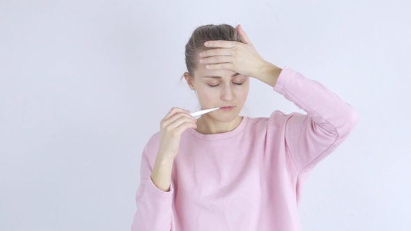 Sick Woman Measuring Her Temperature