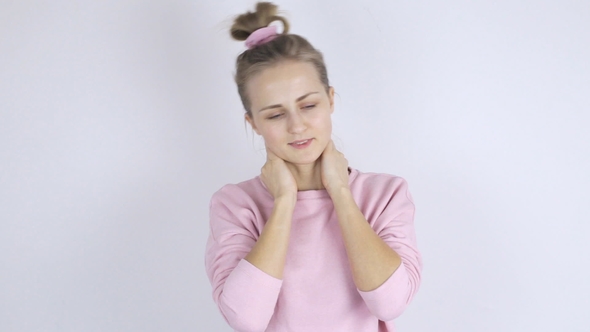 Young Beautiful Woman Has a Pain in Neck