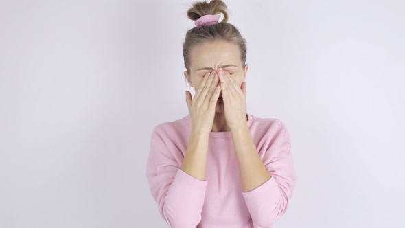 Young Woman Rubs Her Eyes. Eyes Rubbing Concept