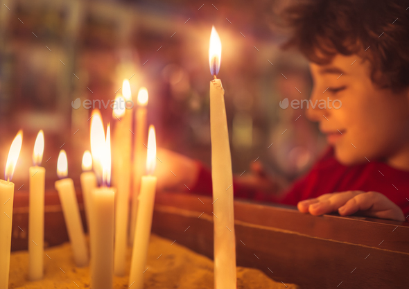Little boy in the church on Easter - Stock Photo - Images