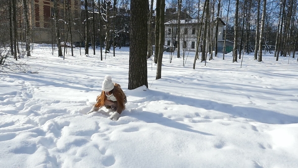 Child Teenage Playing on Snow, Red-Haired Kid Walking at Sunny Winter Day,