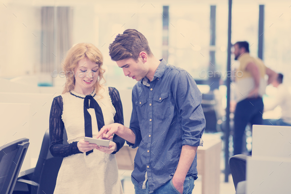 Business People Working With Tablet in startup office - Stock Photo - Images