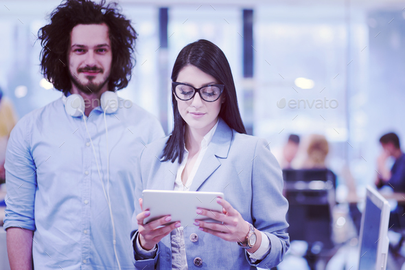 Business People Working With Tablet in startup office - Stock Photo - Images