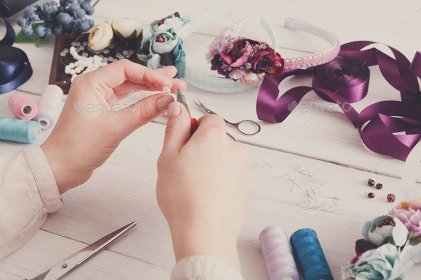 Master making handmade jewelry, woman pov - Stock Photo - Images