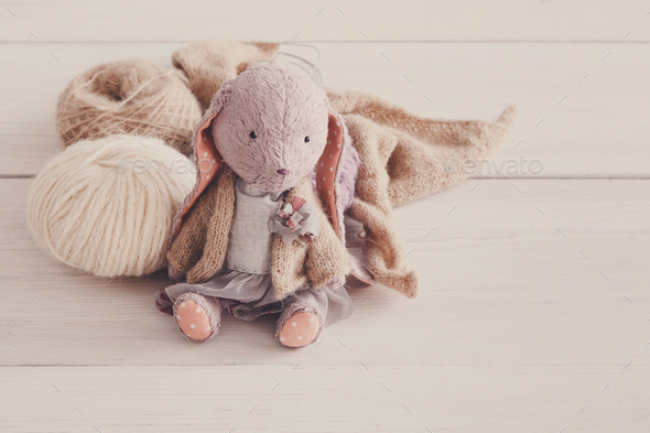 Cute handmade rabbit with wool close up - Stock Photo - Images