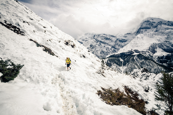 Woman hiker walking in Himalaya Mountains, Nepal - Stock Photo - Images