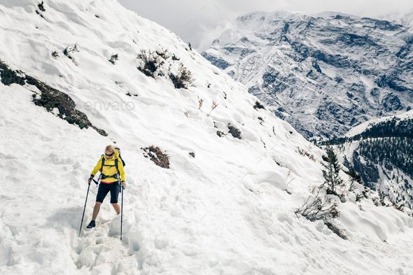 Woman hiker walking in Himalaya Mountains, Nepal - Stock Photo - Images