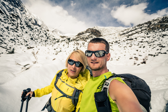 Couple hikers selfie portrait in winter mountains - Stock Photo - Images