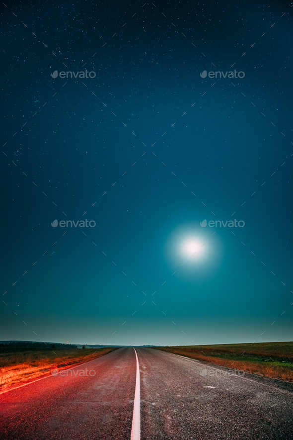 Night Starry Sky With Moon Above Country Asphalt Road In Country - Stock Photo - Images