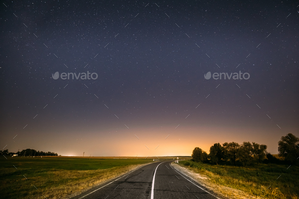 Night Starry Sky Above Country Road In Countryside And Green Fie - Stock Photo - Images