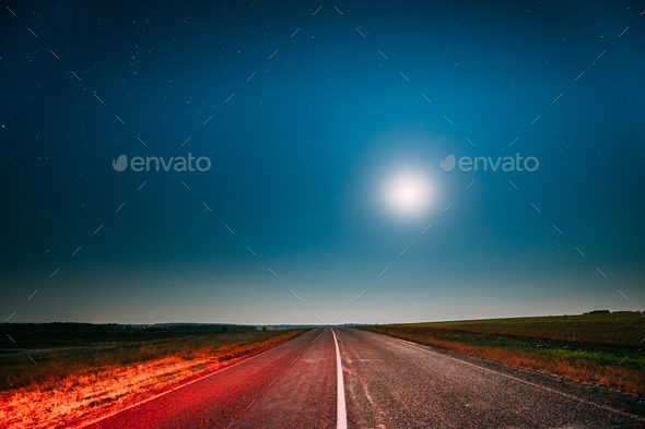 Night Starry Sky With Moon Above Country Asphalt Road In Country - Stock Photo - Images