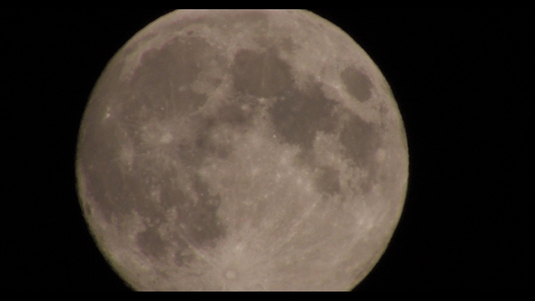 Huge Full Moon in Night Skies with Atmospheric Distortion