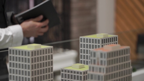 Businessman Is Looking in His Diary alt