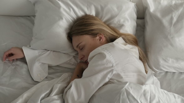 Girl Is Sleeping in the Bedroom