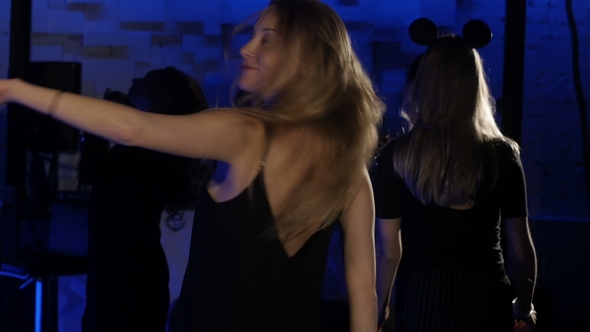 Girl Is Dancing in the Nightclub