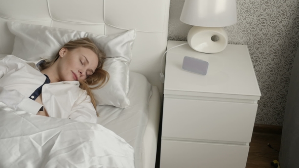 Girl Is Sleeping in the Bedroom