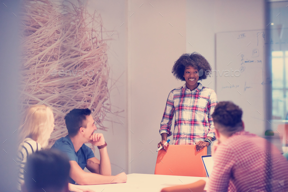 Multiethnic startup business team on meeting - Stock Photo - Images