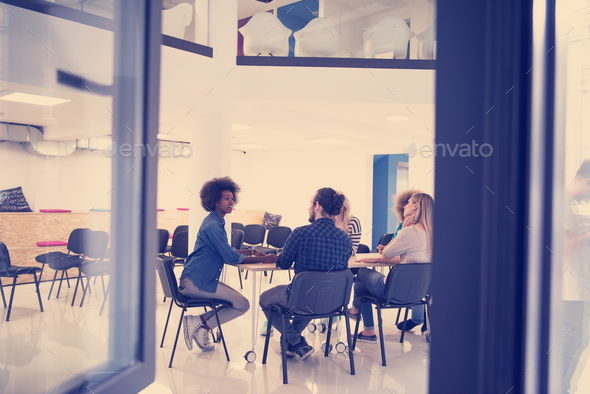 Multiethnic startup business team on meeting - Stock Photo - Images