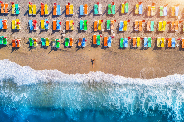 Aerial view of lying woman on the beach - Stock Photo - Images