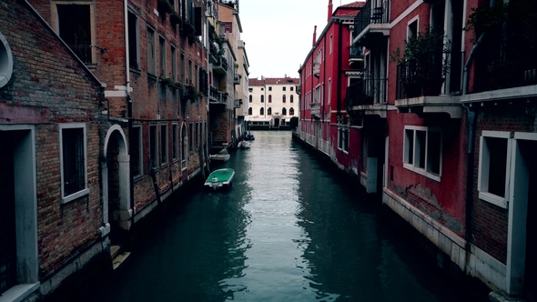 Boats in Venice Canals with No Traffic at Evening