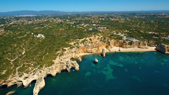 Rocky Coastline with Caves and Cliffs in Algarve Region, Portugal