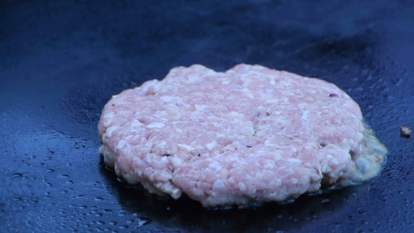Cook Uses a Blow Torch To Melt Cheese on a Meat Cutlet Chef Melts Cheese on a Burger Using a Blow