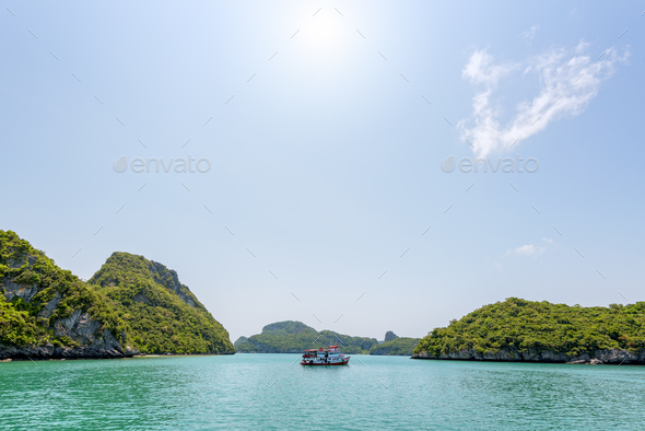 Boat for travel anchored in the sea - Stock Photo - Images