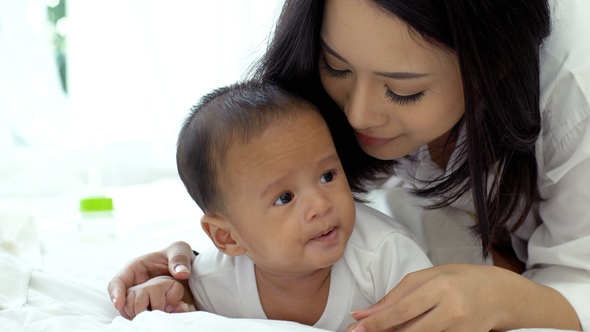 Beautiful Asian Mother With A Baby 44 alt
