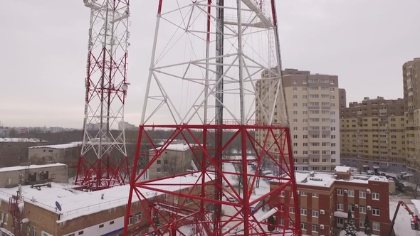 Aerial View on a Telecommunication Tower in a Winter Cloudy Daytime