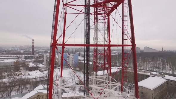 Aerial View on a Telecommunication Tower in a Winter Cloudy Day
