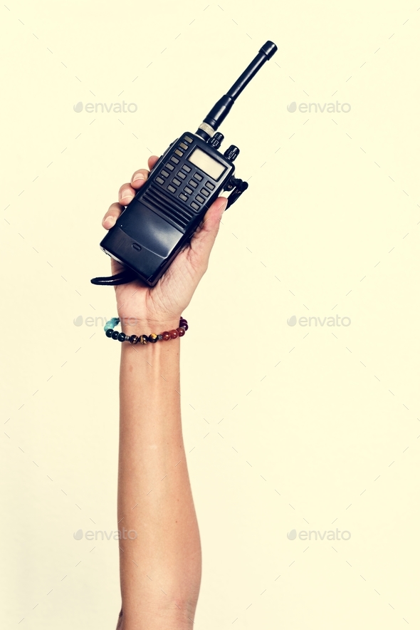 Hand holding portable two way radio isolated on white Stock Photo by Rawpixel