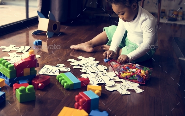 African descent kid enjoying puzzles Stock Photo by Rawpixel | PhotoDune
