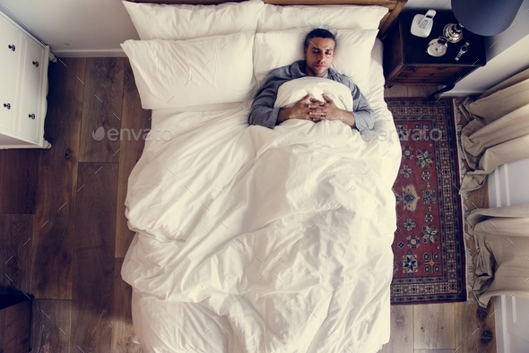 French man sleeping alone on bed Stock Photo by Rawpixel | PhotoDune