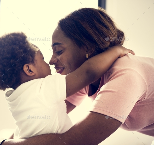 Single mom enjoying precious time with her child Stock Photo by Rawpixel