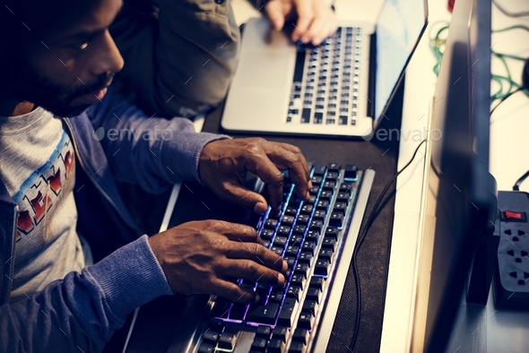 Hacker using keyboard typing phishing on the internet Stock Photo by Rawpixel