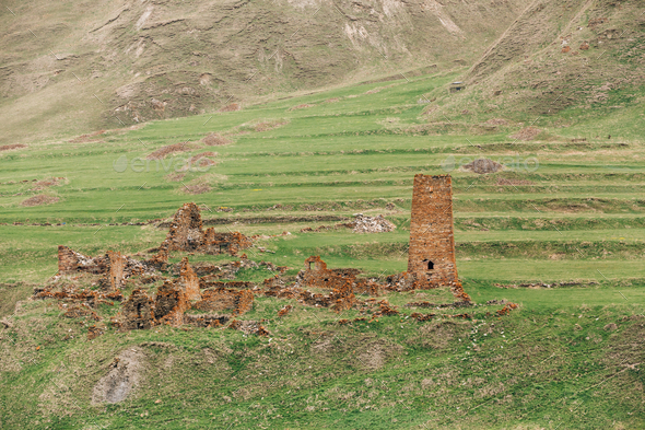 Ancient Old Stone Watchtower On Mountain Background In Chetoyta - Stock Photo - Images